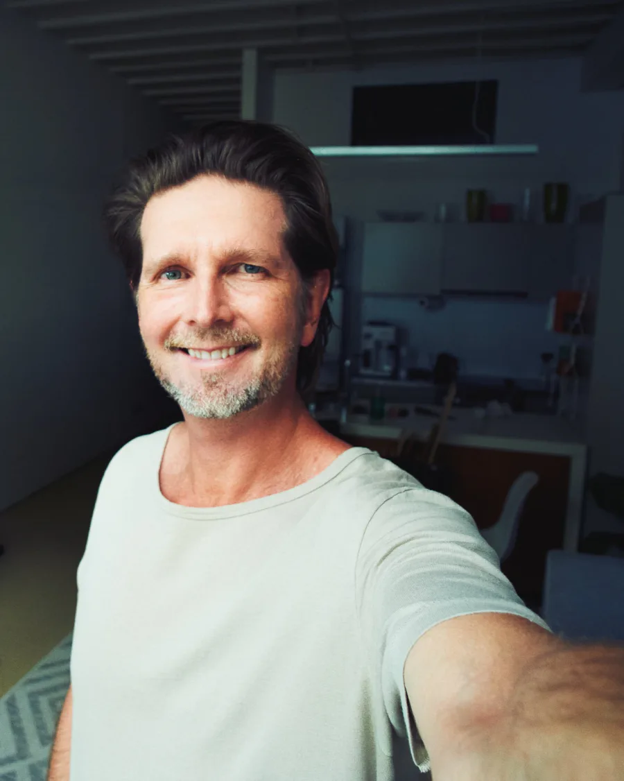 Dave Blake smiling in his studio.